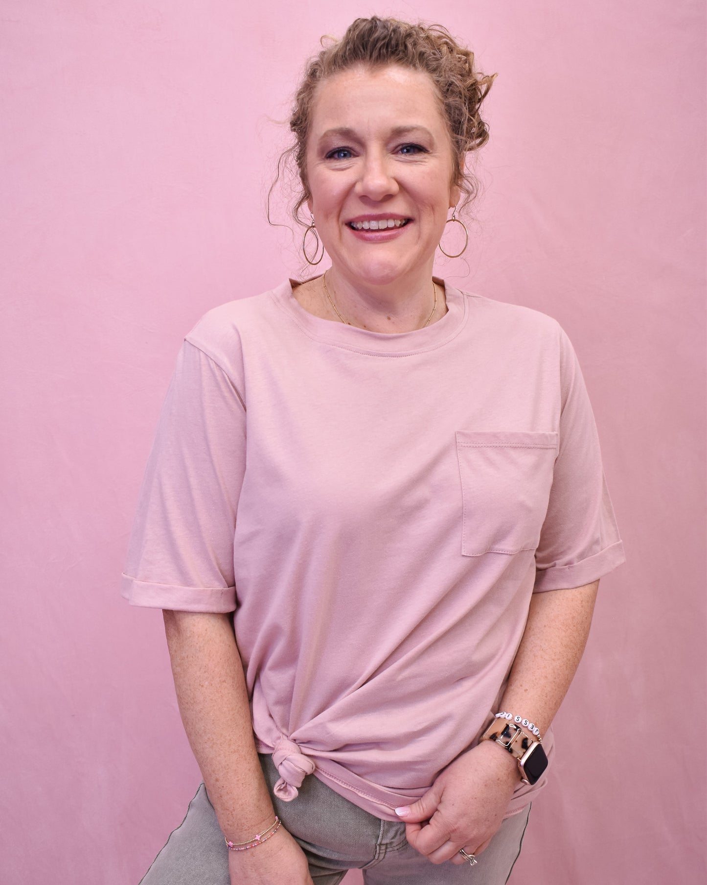 short sleeve pink colored tee with front chest pocket and oversize fit