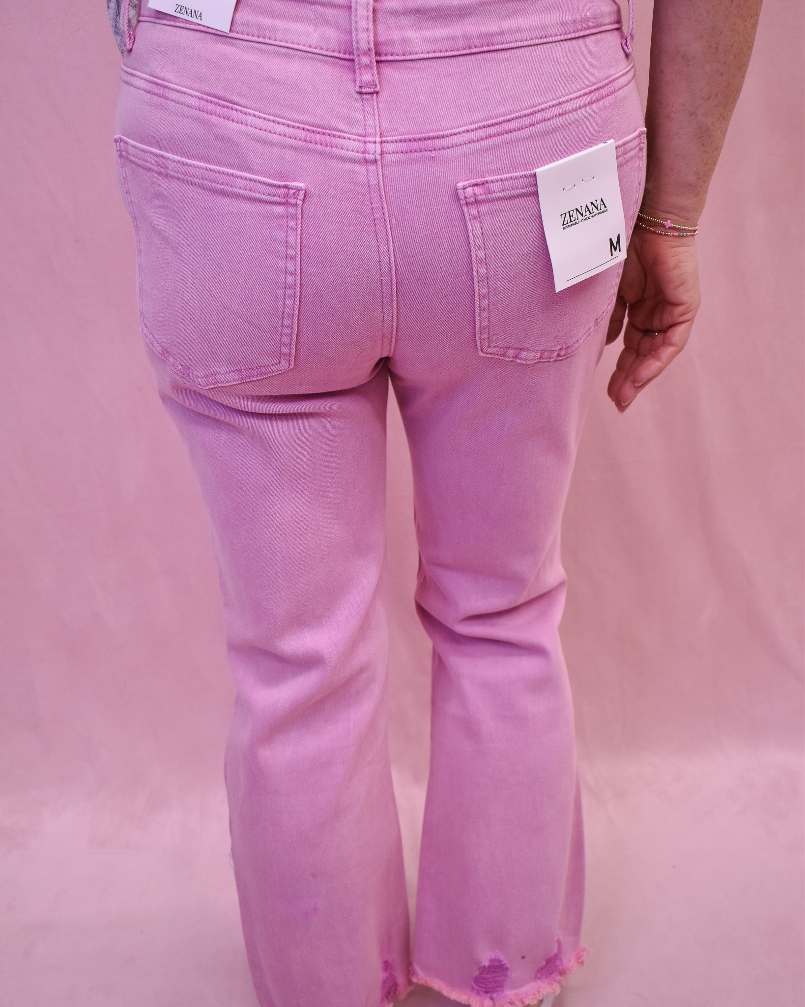 light pink denim with distressing