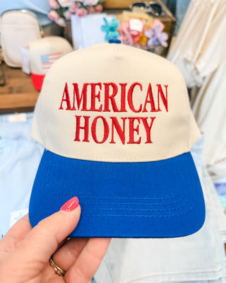 canvas hat with blue bill embroidered with american honey