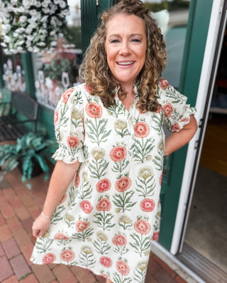 a fall floral a line style dress with a puff style sleeve