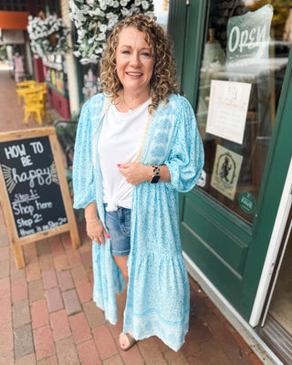 a paisley printed tiered kimono with front tie