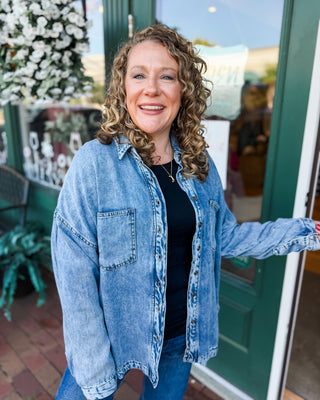 a long sleeve vintage denim washed button down shacket