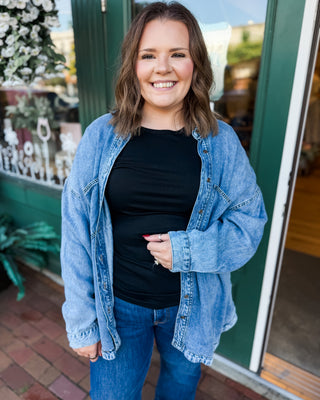 a long sleeve vintage denim washed button down shacket