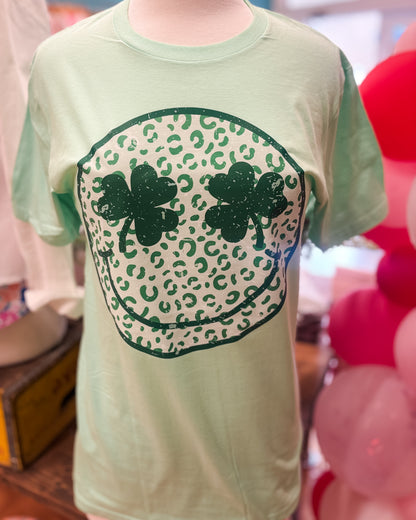 Leopard happy face with shamrock eyes