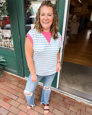 color block striped top in light blue with pink accents