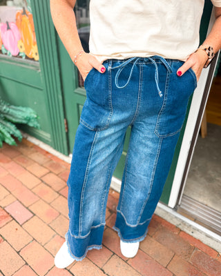 Denim Done Easy Drawstring Raw Hem Wide Leg Jeans in a dark wash
