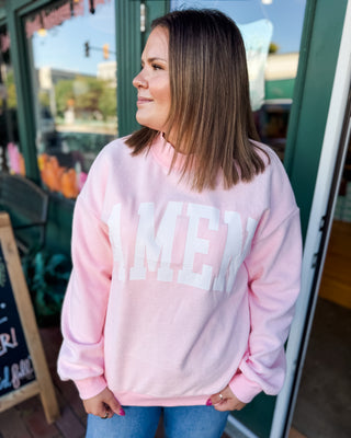 a pullover mock neck reversible sweatshirt with the words WWJD and Amen