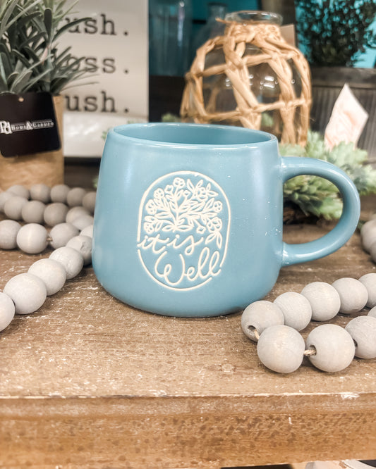 It is well stoneware 16oz coffee mug in blue