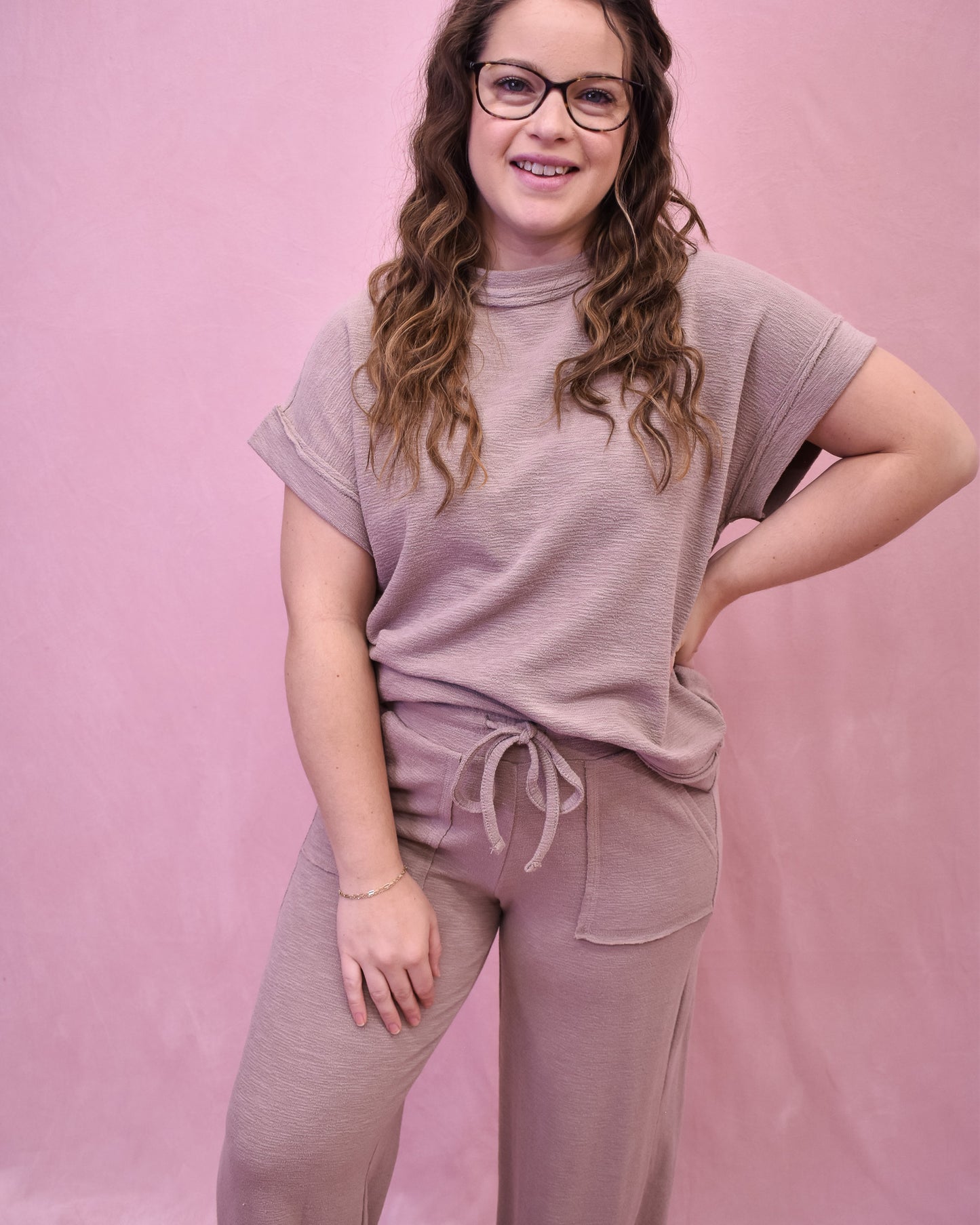 a two piece set in a monochrome color scheme with a drawstring waist and slub style