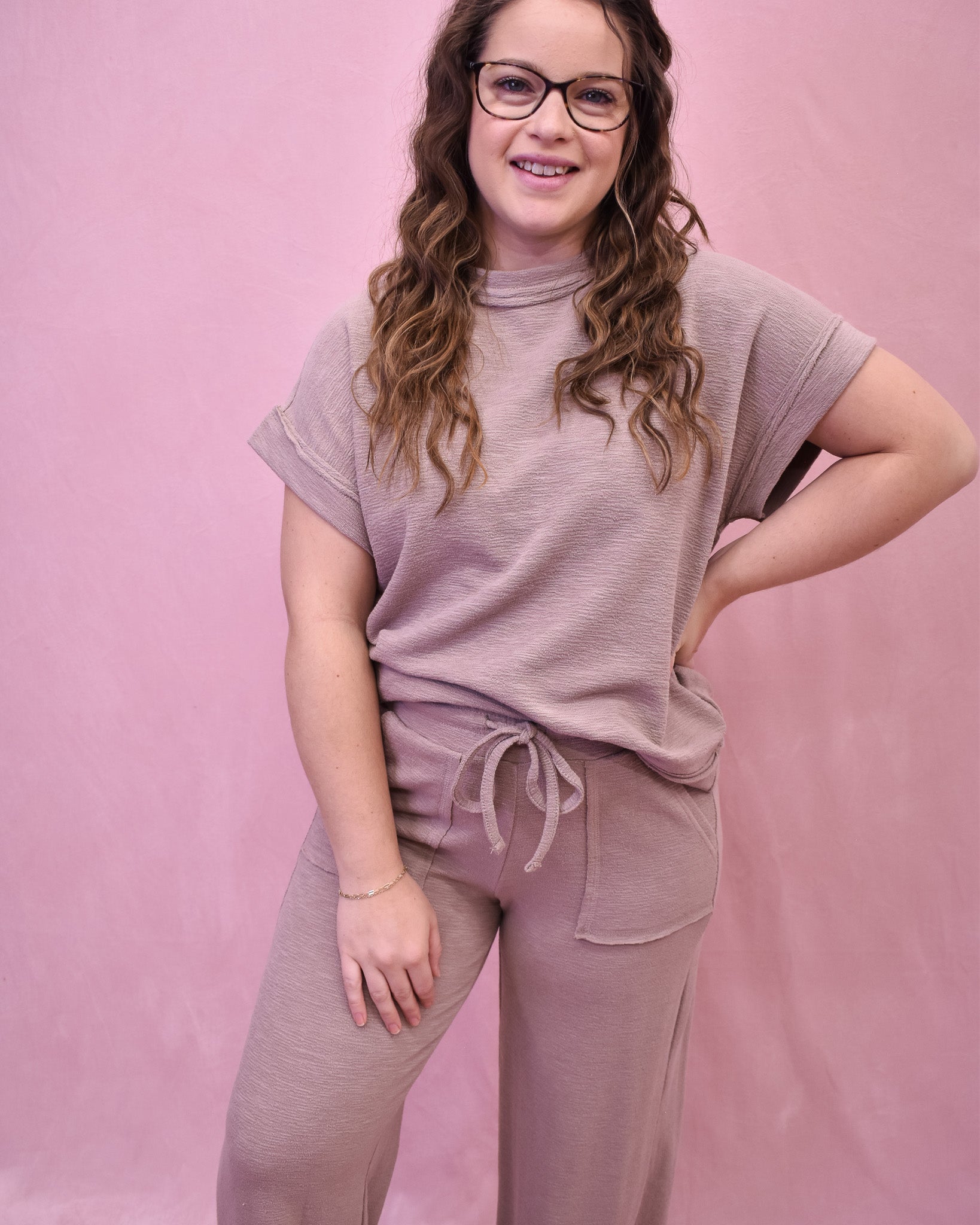 a two piece set in a monochrome color scheme with a drawstring waist and slub style