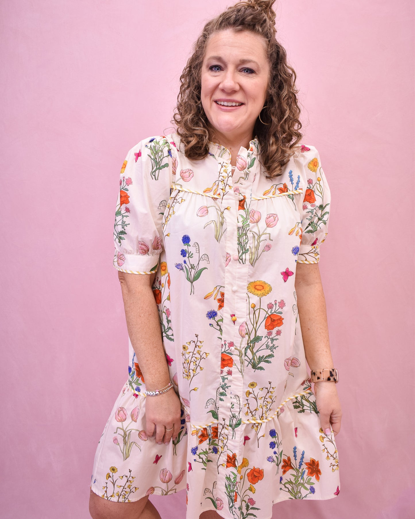 Floral Watercolor design drop hem dress in cream.