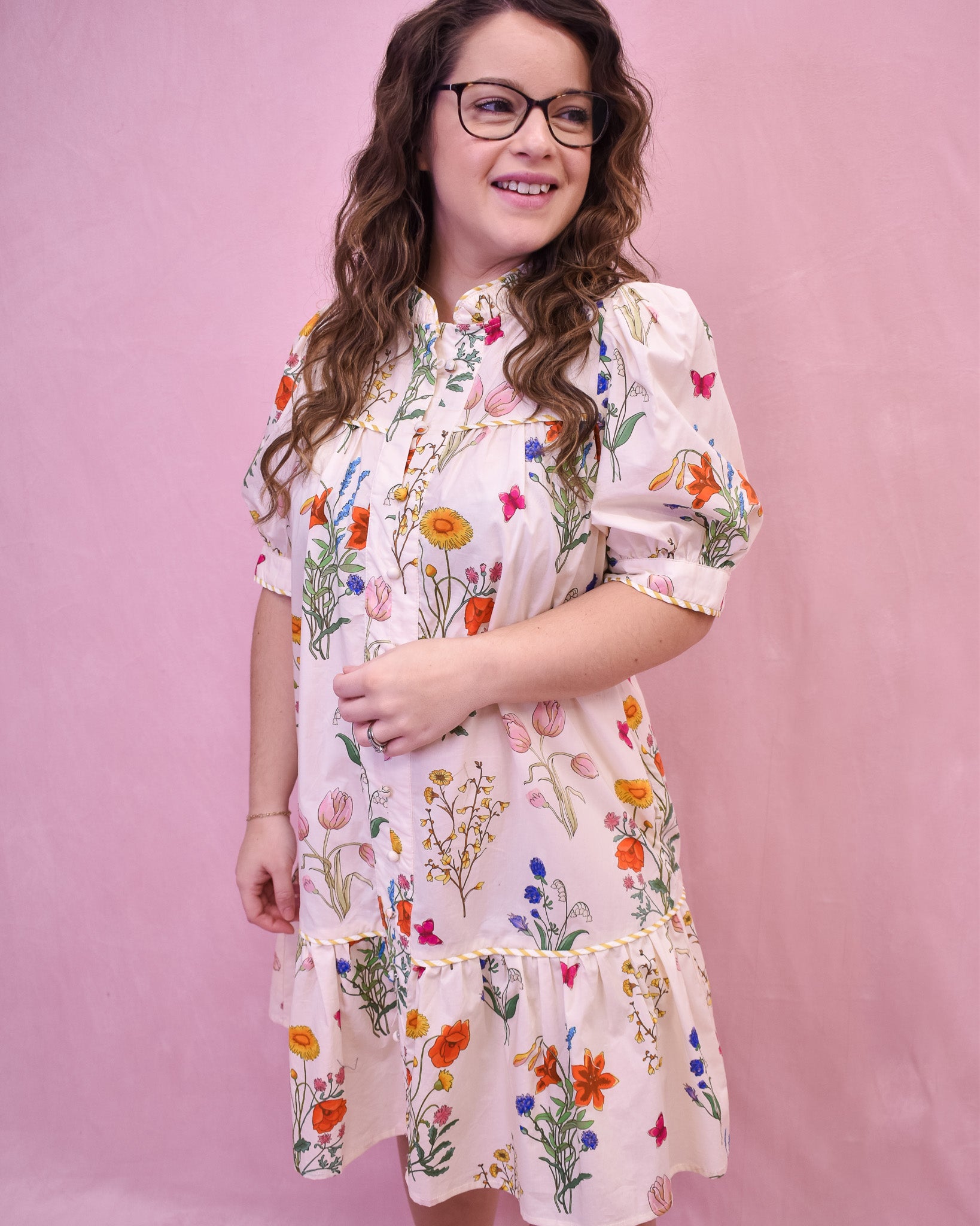 Floral Watercolor design drop hem dress in cream.