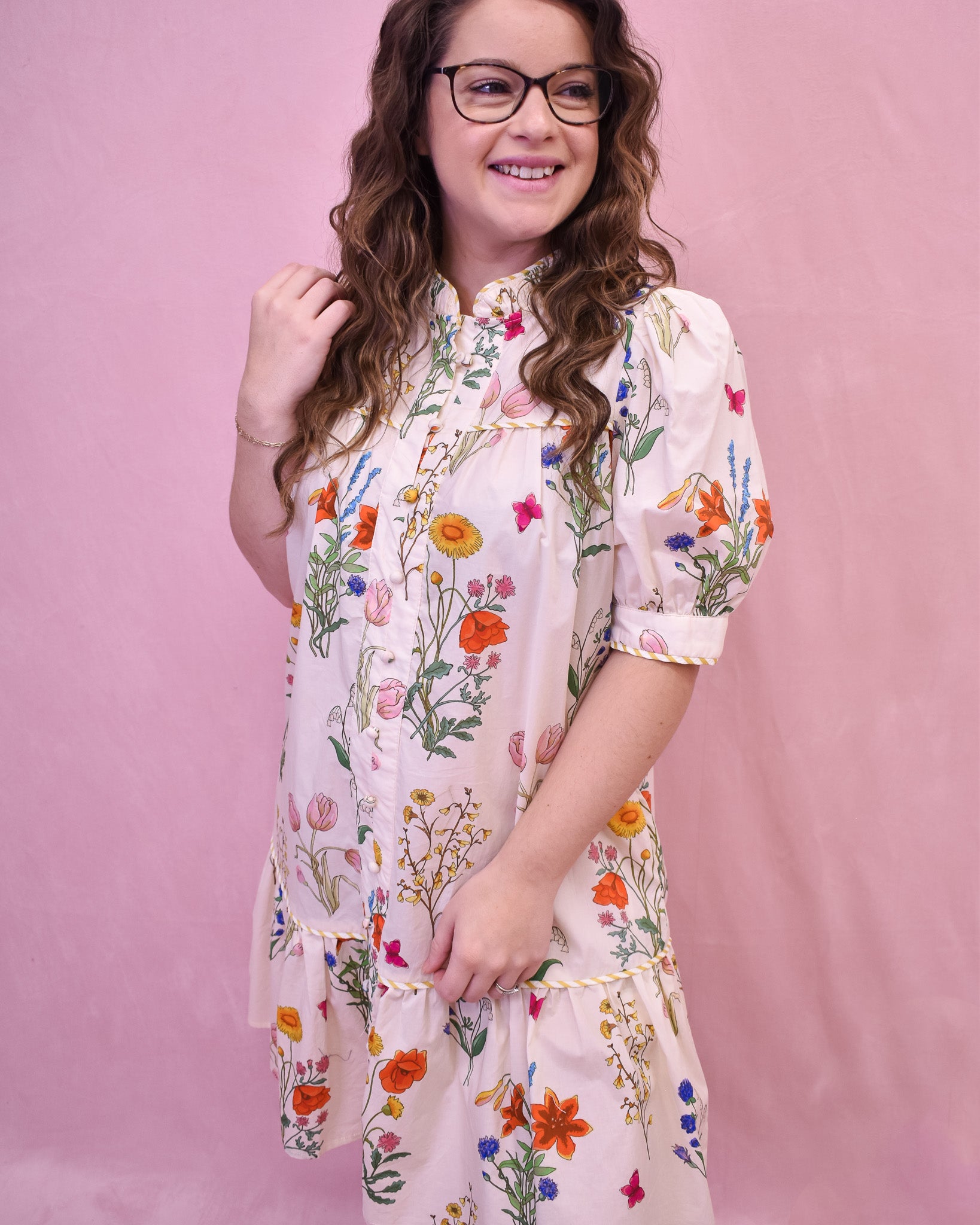 Floral Watercolor design drop hem dress in cream.