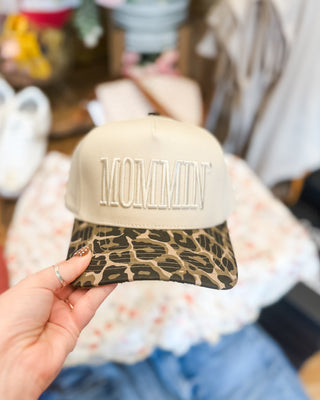 Mommin' embroidered on a leopard bill canvas snapback hat