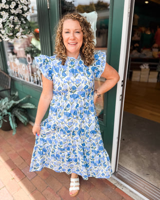 a blue and light blue floral midi dress with ruffle cap sleeves