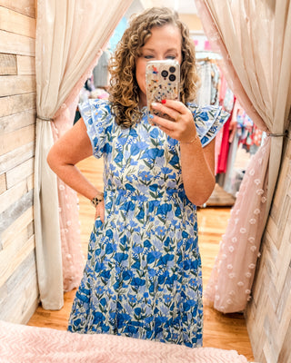 a summer tiered flutter sleeve midi dress