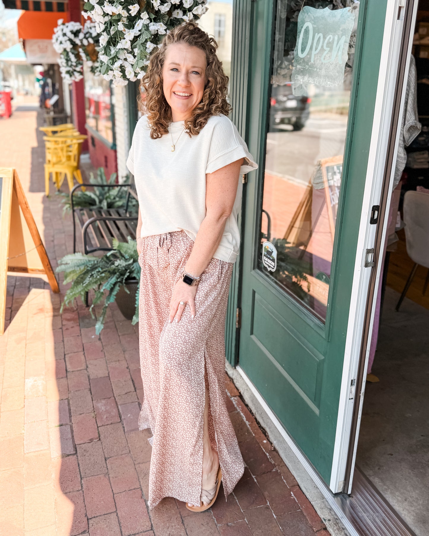 Floral wide leg pants in blush with front waist tie and side leg slits