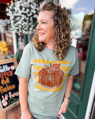 A striped pumpkin sage colored graphic tee