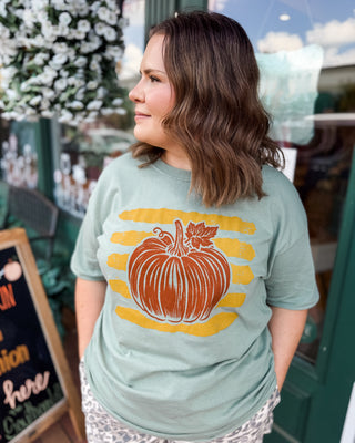 A striped pumpkin sage colored graphic tee