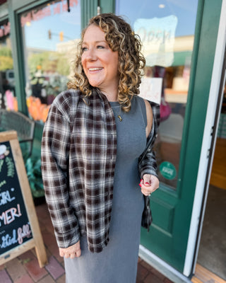 a long sleeve button down plaid layering  shirt in a chocolate brown plaid