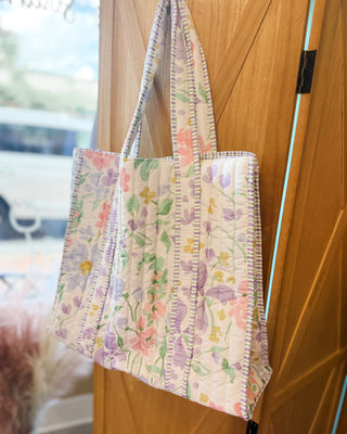 a watercolor floral tote bag