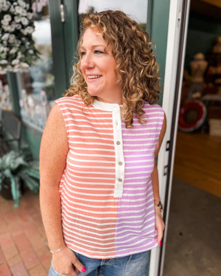 a striped color block sleeveless top with button down front