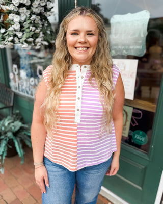 a striped color block sleeveless top with button down front