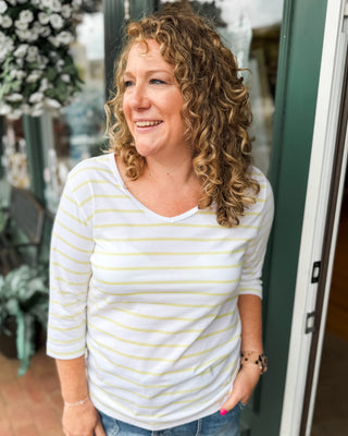 a vneck yellow striped 3/4 sleeve top