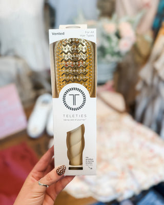 Teleties cream colored vented hairbrush