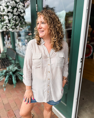 a long sleeve striped button down casual top