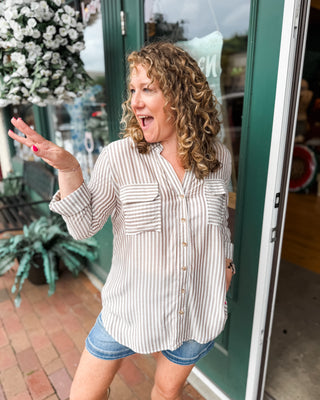 a long sleeve striped button down casual top