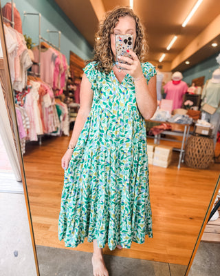 a summer tropical midi dress