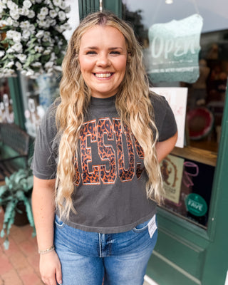 a black crop baby tee with JESUS leopard print graphic