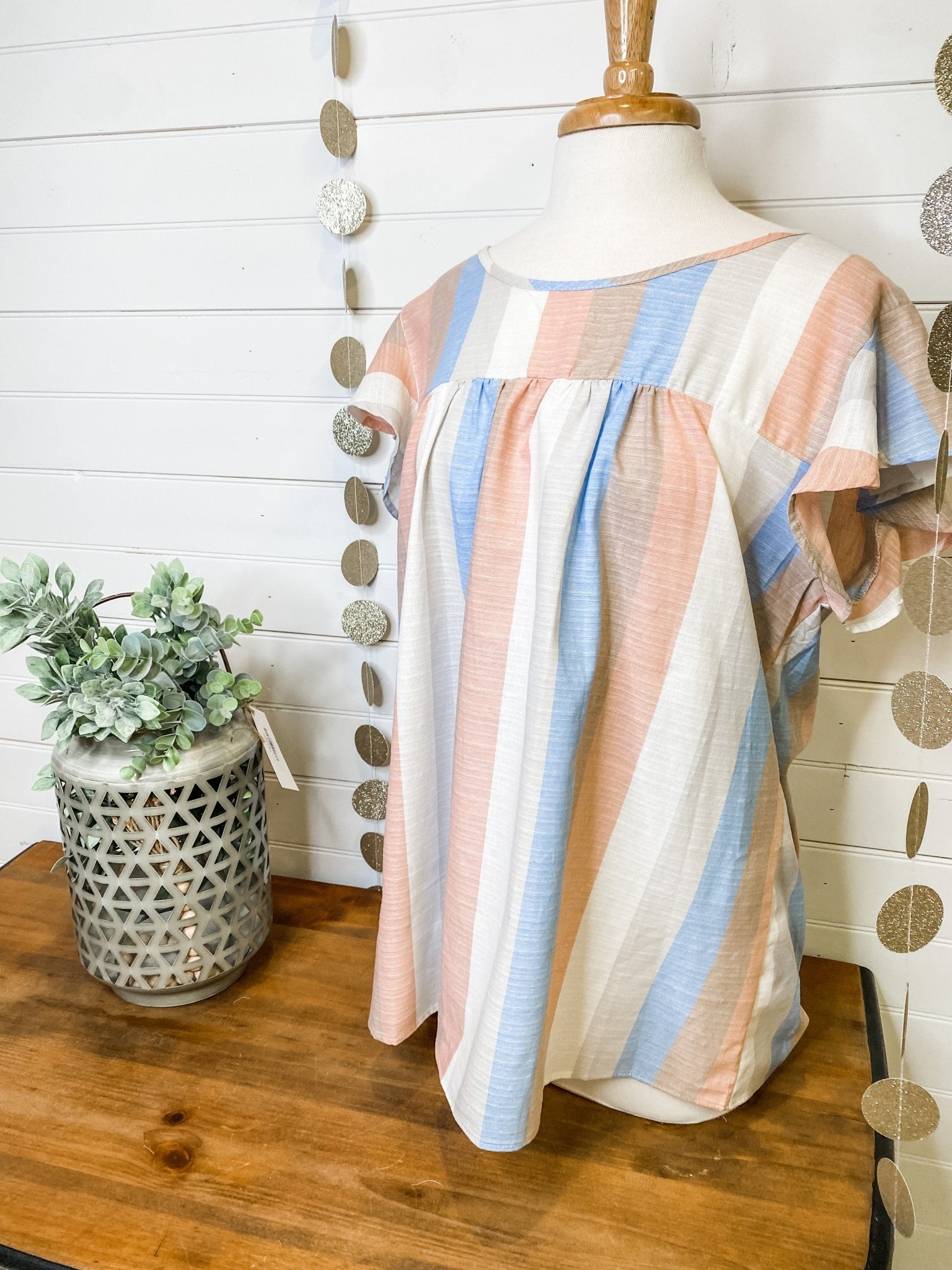 a striped ruffle sleeve style top